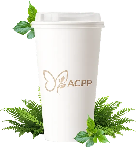 ACPP compostable cup surrounded by foliage